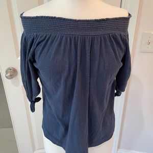 Women’s off the shoulder top.